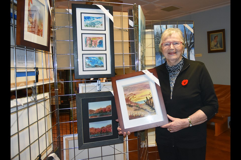 Kathryn Vandenheuvel, member of the South Simcoe Palette Club, with original artwork on display as part of the Innisfil Studio Tour. Miriam King/Bradford Today