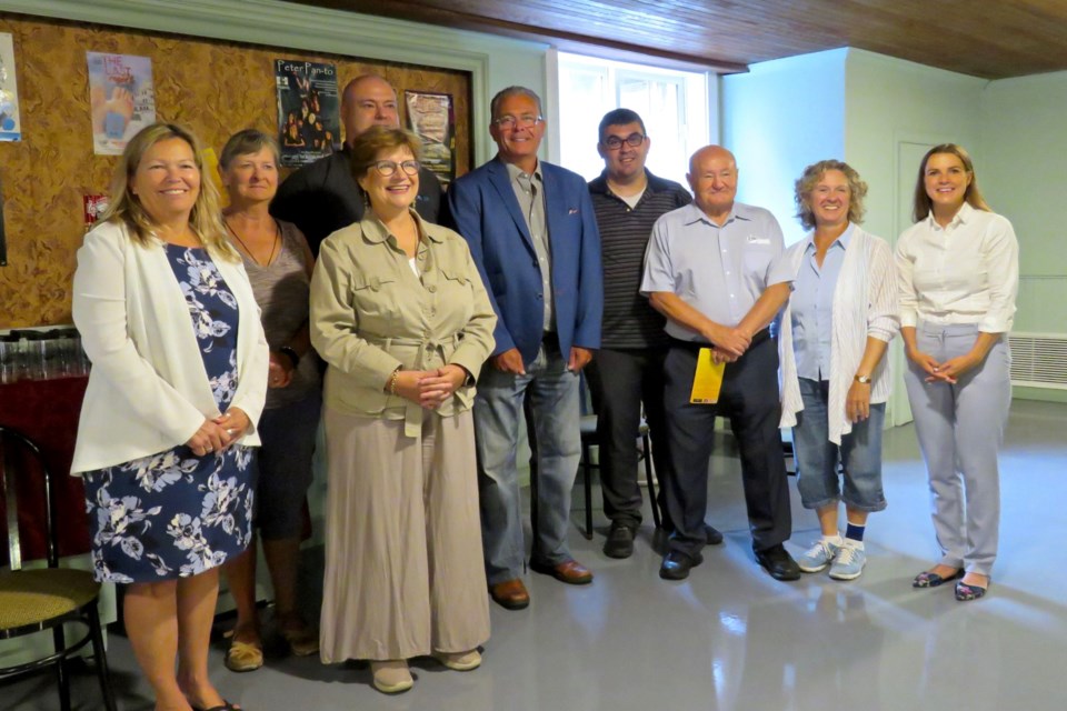 Gathered in the freshly painted South Simcoe Theatre lobby (from left) are Innisfil Mayor Lynn Dollin, SST treasurer Sue Bennett, SST president Nancy Chapple Smokler, Ontario Trillium Foundation volunteer Gary Marshall, Innisfil Coun. Rob Nicol, SST secretary Dan Galea, SST vice-president George Gibson, SST box office manager Candy Pryce, and Barrie-Innisfil MPP Andrea Khanjin.