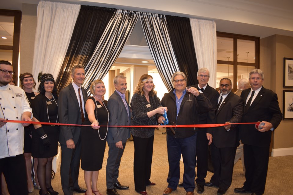 Council and staff celebrate the grand opening with a ribbon cutting ceremony on Wednesday evening. Melanie Pileggi for BradfordToday