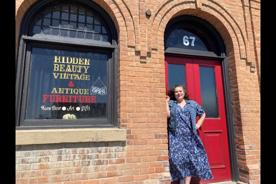 Lorraine Schmidt stands in front of her new store, Hidden Beauty Vintage in Bradford’s downtown core