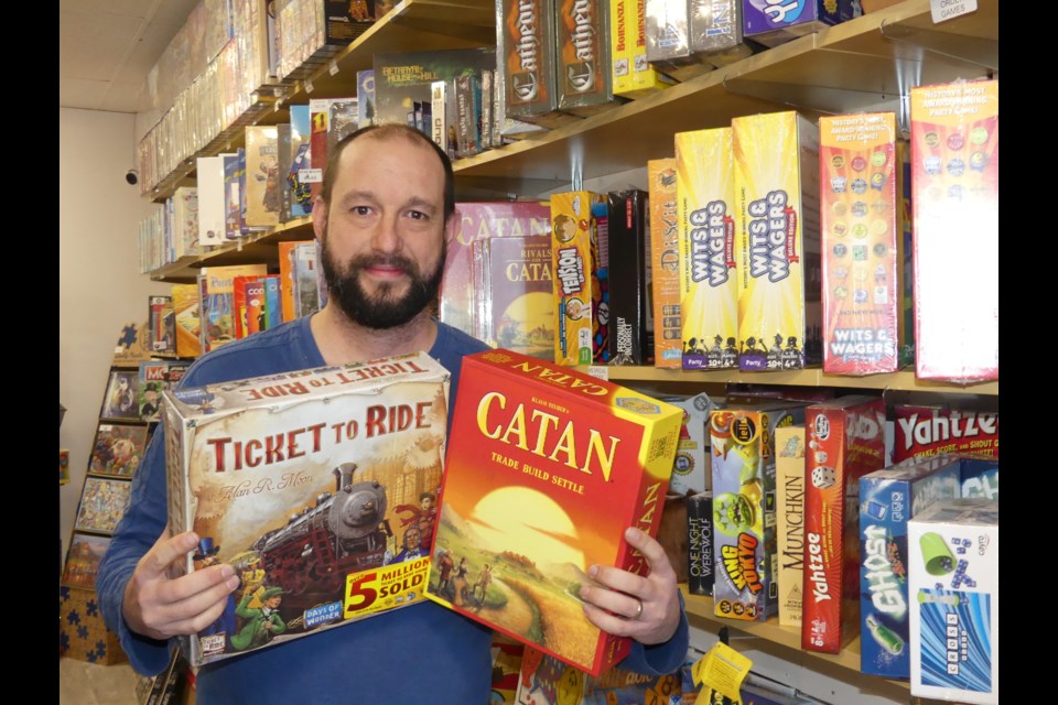 Brian Hayden, co-owner of Experience Toys and Games in downtown Bradford, is starting a board games night. Jenni Dunning/BradfordToday