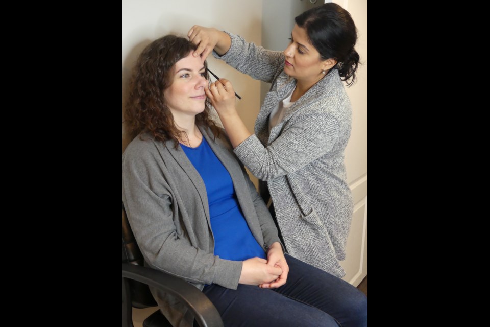 Jenni giving her eyebrows some love with local make-up artist, Sumayya Khan. Submitted photo 