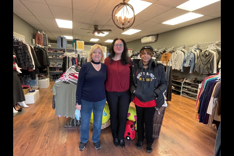 Arlete Azeredo, Manager of Volunteer Resources with volunteer Linda Laviola and co-op student Yiddy.