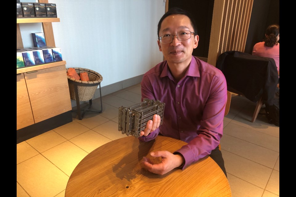 Bradford resident, David Yeh, showing off his invention, the Bitty Big Q. Natasha Philpott/BradfordToday