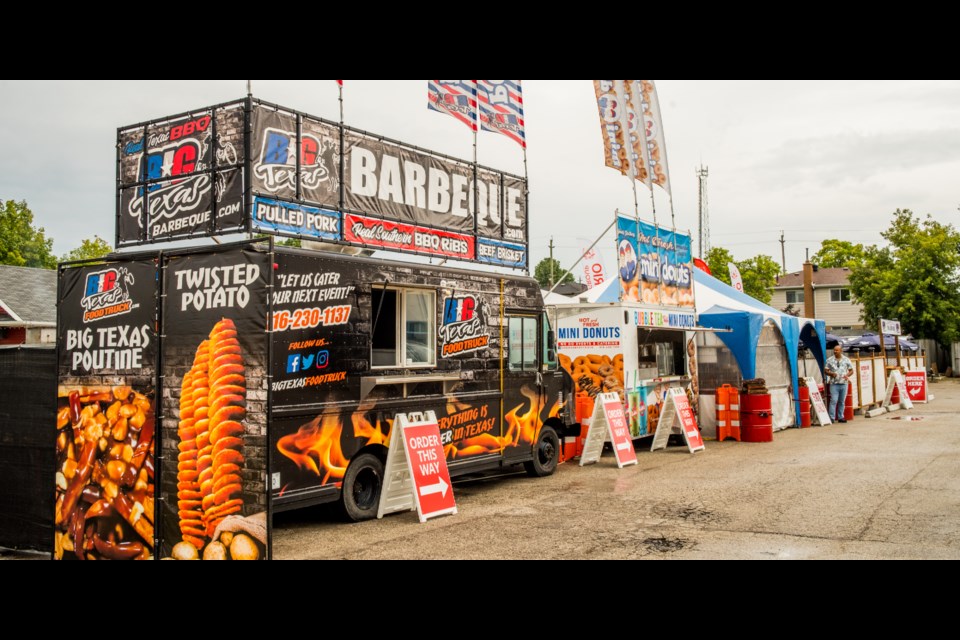Ricky Ribs has created a mini Ribfest venue with his Big Texas BBQ set up including licensed patio and live entertainment on Saturday night. Paul Novosad for Bradford Today.
