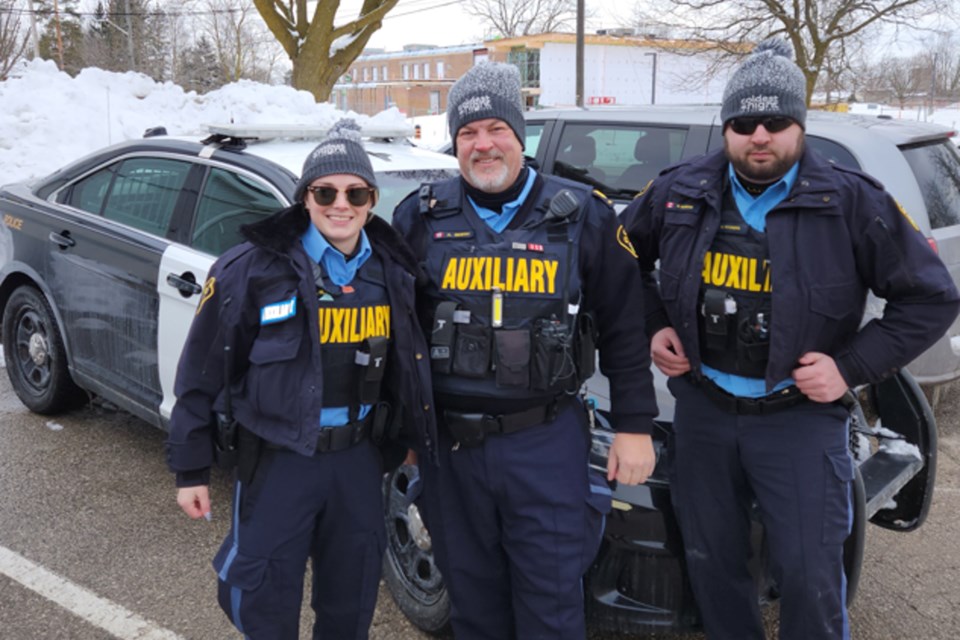 (from left to right) Auxiliary members Katelyn Ridout, Andrew Smith, Nick Schaefer.