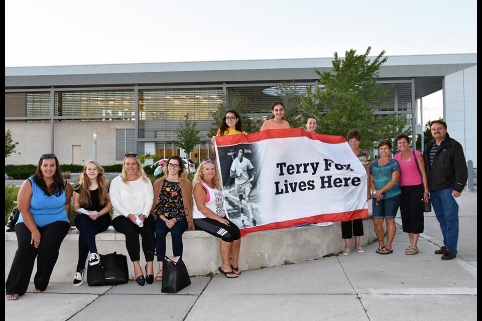 Volunteers get ready for the 2018 Terry Fox Run in Bradford, taking place Sept. 16, starting on the west lawn of the Bradford West Gwillimbury Public Library. Miriam King/BradfordToday
