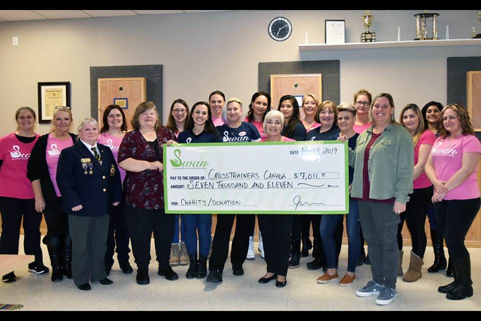 Members of SWAN Bradford, Successful Women Always Networking, and Legion President Tammy Paglia present cheque to CrossTrainers Canada reps Patti LaRose and Shirley Norman. Miriam King/Bradford Today