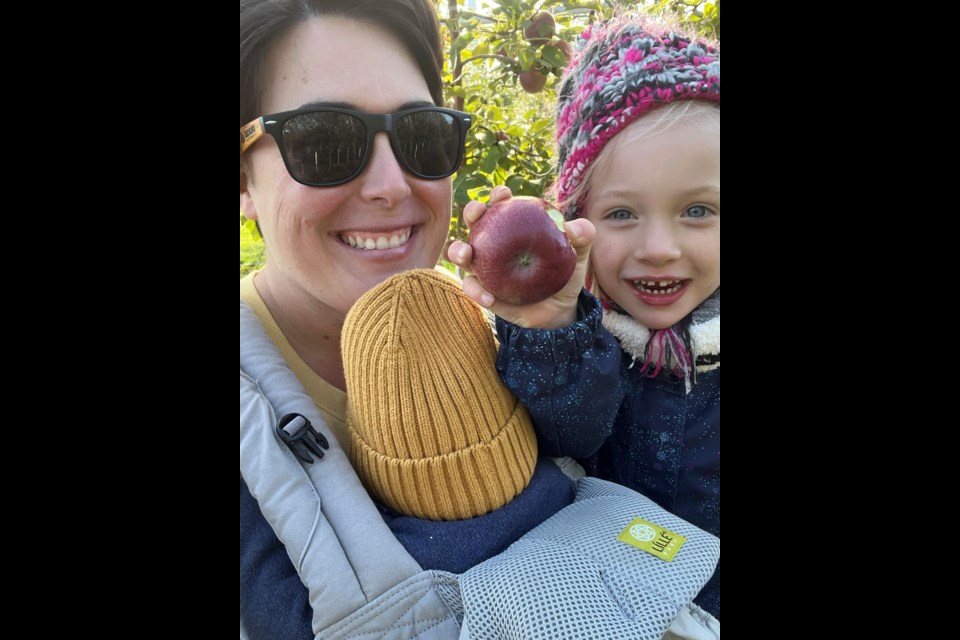 Laura Robert, pictured here with daughter Rose, 4, and son Erik, 5 months, was grateful to receive needed medications from Wide Awake Club group members when her daughter was sick recently.