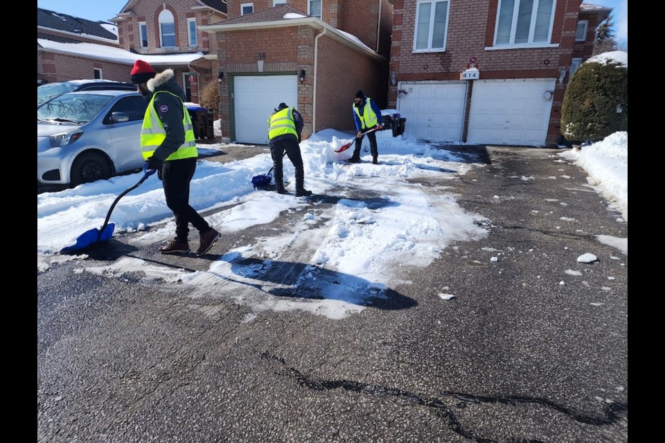 Members of the Ahmadiyya Muslim Youth Association helped Bradford resident with shovelling on March 3 and 4, 2023.
