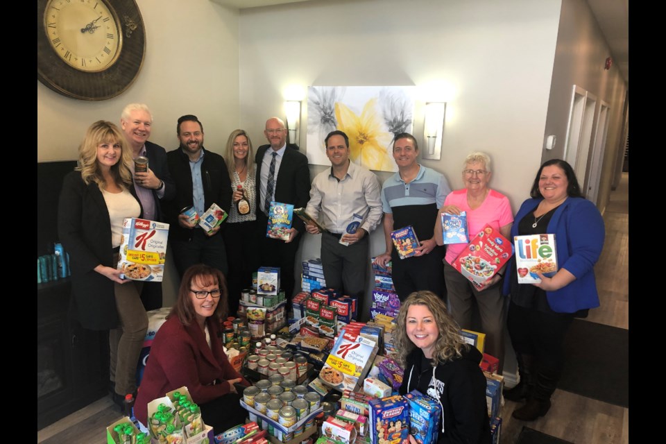 The team at Royal Lepage with Coun. Peter Ferragine and The Helping Hand Food Bank President, Anne Silvey. Natasha Philpott/BradfordToday