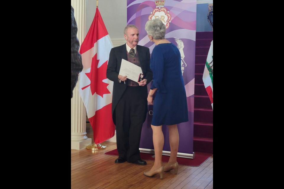 Jim Culbert is received a Queen Elizabeth II Platinum Jubilee Medal.
