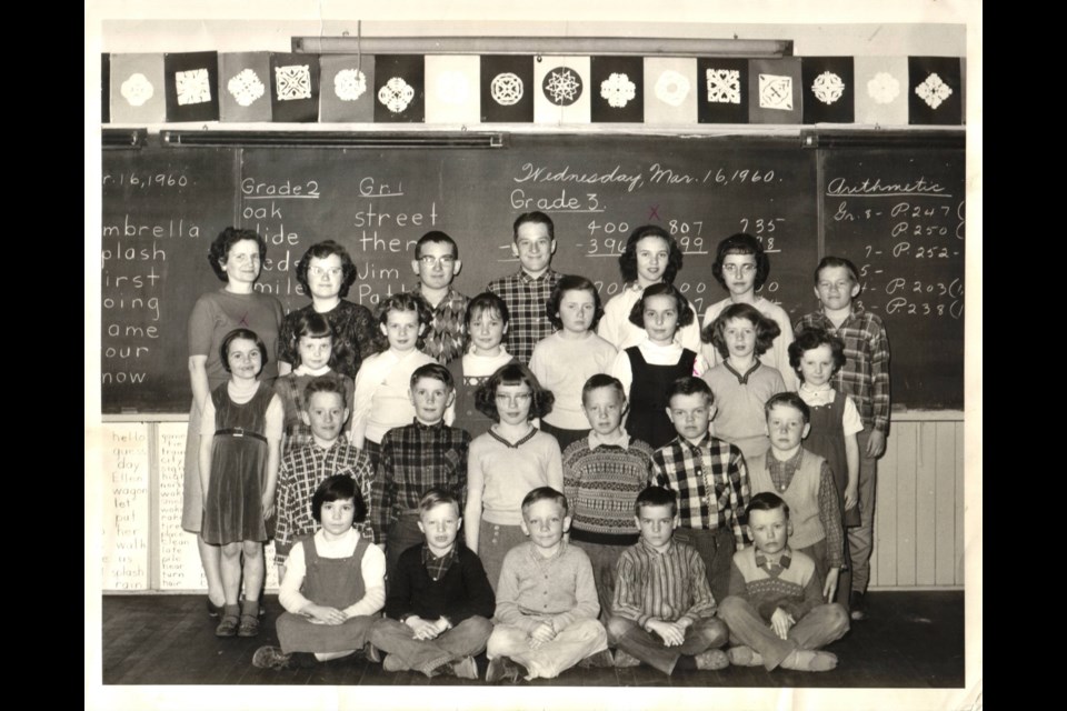 Staff and students are shown at the SS#3 schoolhouse in 1960.