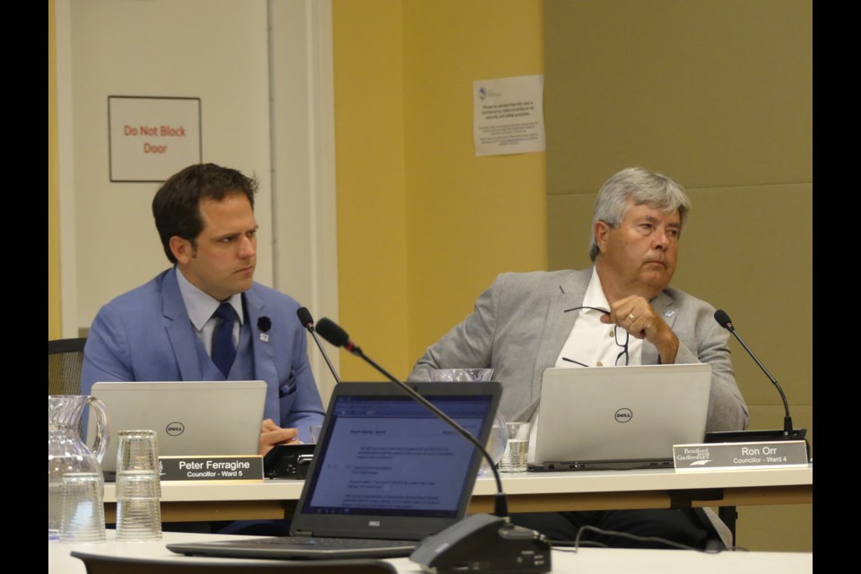 BWG councillors Peter Ferragine, left, and Ron Orr at a council meeting. Jenni Dunning/BradfordToday