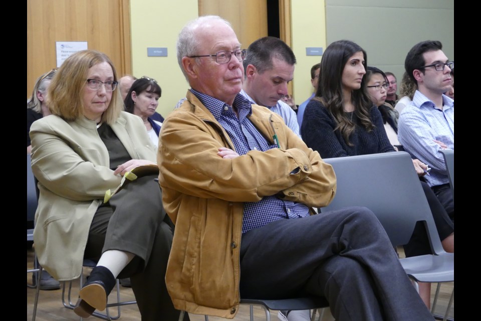Bradford West Gwillimbury residents listen to people share their questions and concerns about the town's new official plan at a meeting April 30. Jenni Dunning/Bradford Today