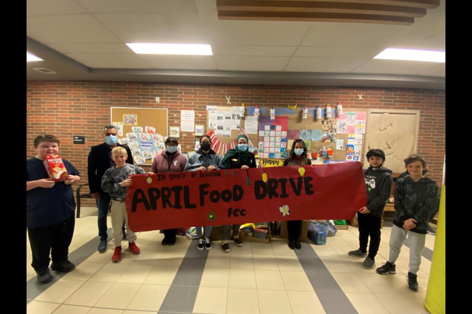 Fred C. Cook Public School donated 600 food items to local refugees as part of their ‘Holiday Seaskn of Fred C. C.’ celebrations