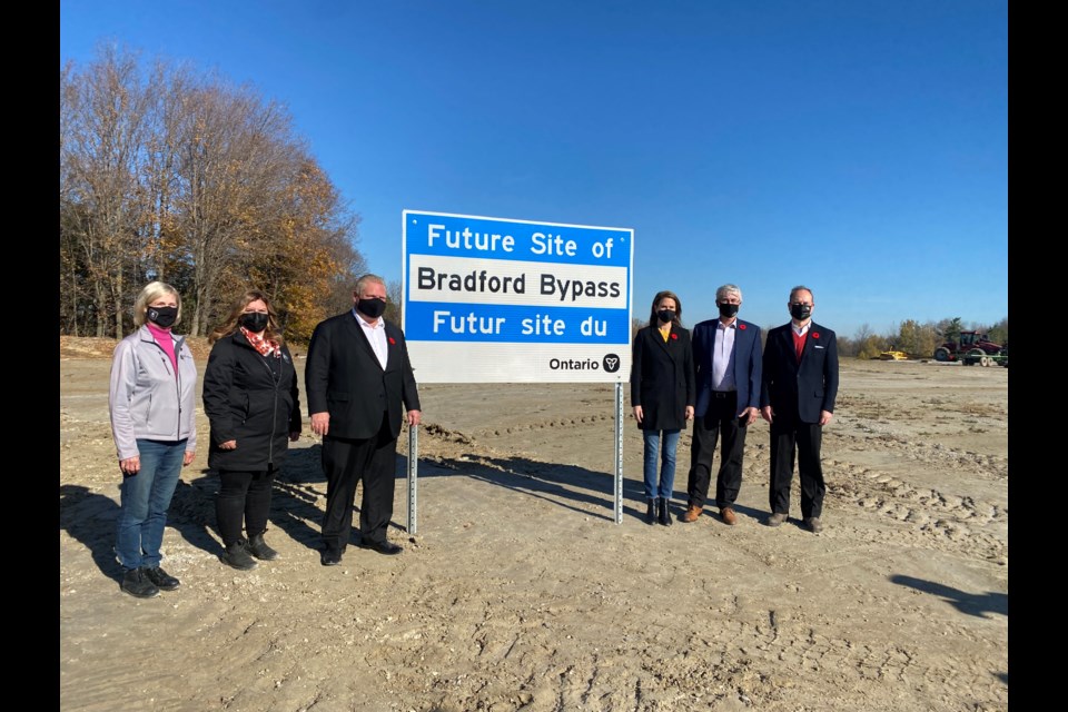 From left are East Gwillimbury Mayor Virginia Hackson, Holland Marsh Growers' Assocation executive director Jody Mott, Premier Doug Ford, York-Simcoe MPP and Transportation Minister Caroline Mulroney, Bradford West Gwillimburt Mayor Rob Keffer, and Finance Minister Peter Bethlenfalvy.