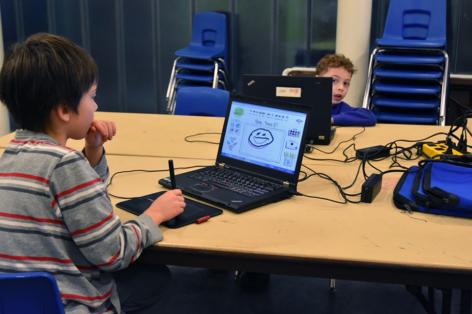 Kids learn how to use the computer to create animation, at a Kids Great Minds workshop. Miriam King/Bradford Today