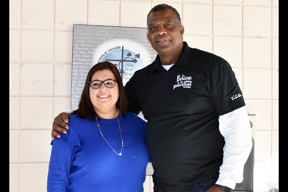 Karl Subban, inspirational speaker, with St. Teresa of Calcutta Catholic School Principal Susie Newman, during Black History Month. Miriam King/Bradford Today