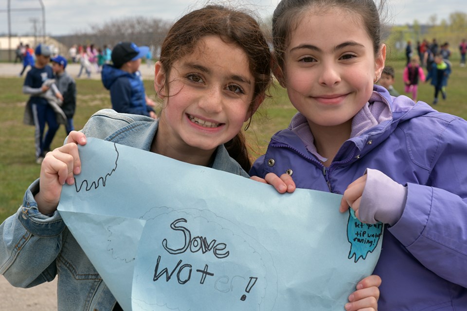 Kids at St. Marie made their own signs, and walked for Clean Water. Miriam King/Bradford Today