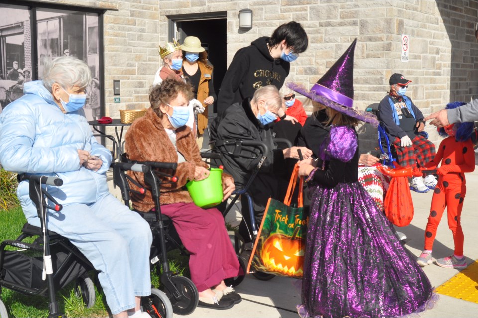 The Elden of Bradford celebrated Halloween with some early 'trick-or-treating' outside in the parking lot at the centre where the client seniors handed out candy to local children dressed in costume. 