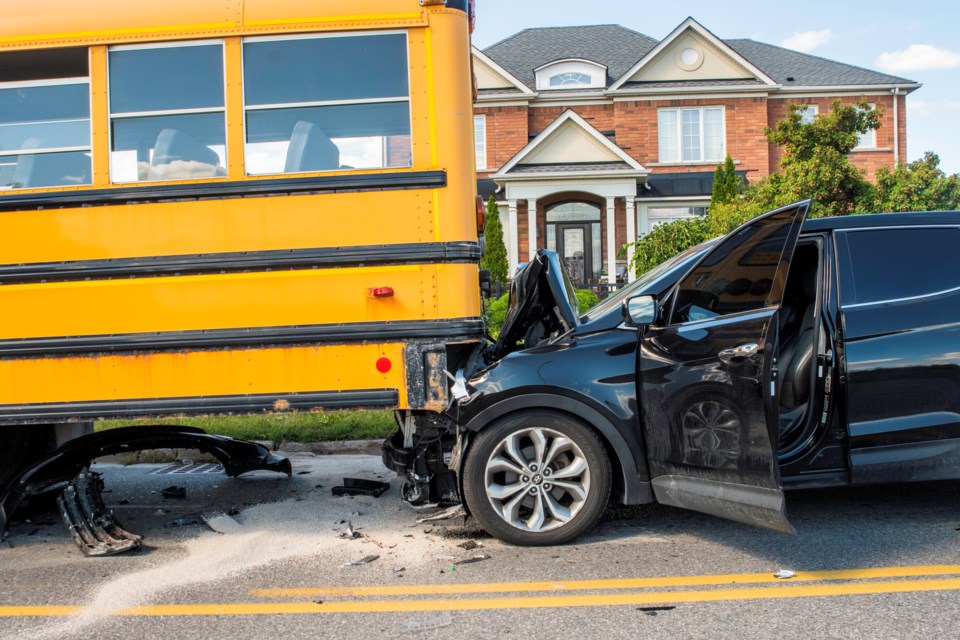 Vehicle crashes into school bus at West Park and Line 6 Wednesday afternoon. Paul Novosad for Bradford Today.
