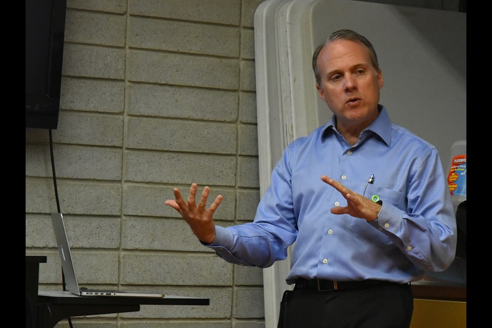 Cardiologist Dr. Bradley Dibble shared his research into climate change at the Cookstown public library on April 23. Miriam King/Bradford Today