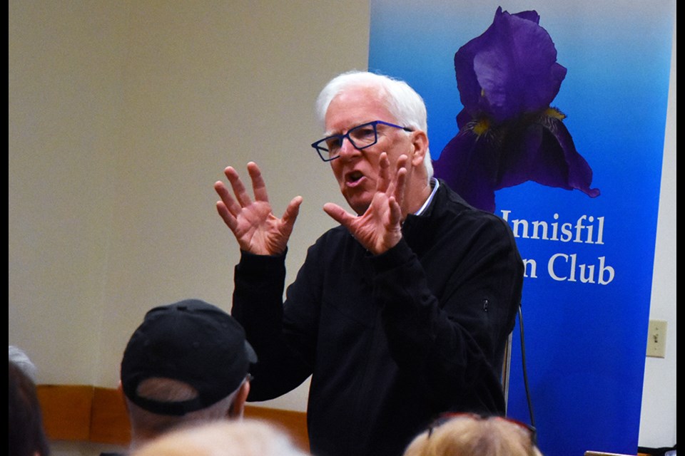 Dave Phillips describes extreme weather at a meeting of the Innisfil Garden Club, Sept. 9. Miriam King/Bradford Today