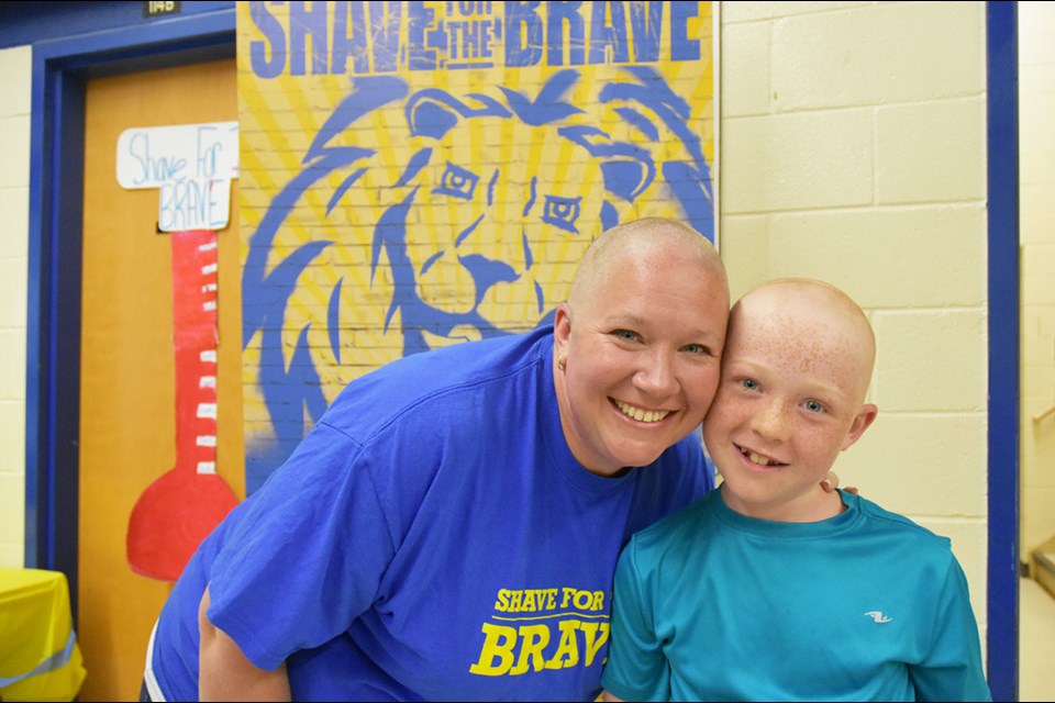 Paula Ferguson and son Bobby both had their heads shaved. Miriam King/Bradford Today