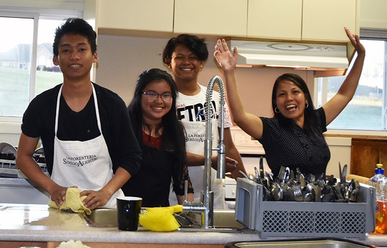 Young volunteers in the kitchen at Green Valley Alliance Church, during the National Indigenous Peoples Day dinner and fundraising auction. Miriam King/Bradford Today