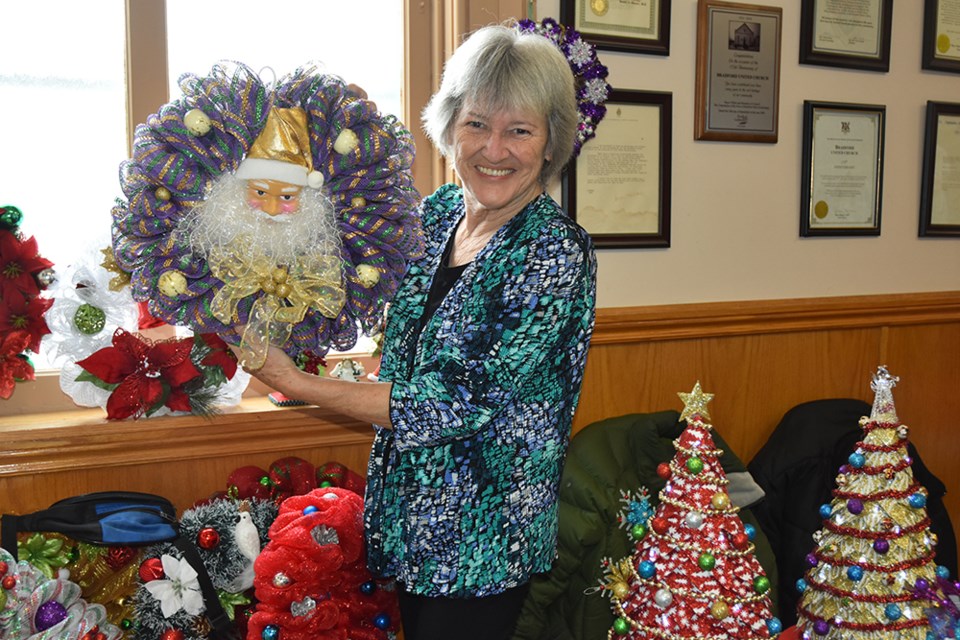 Victoria Sheppard brought wreaths, Christmas ornaments, decorated trees and Santa Sleighs filled with treats to the Bradford United Church Christmas Bazaar and Craft Show. Miriam King/BradfordToday
