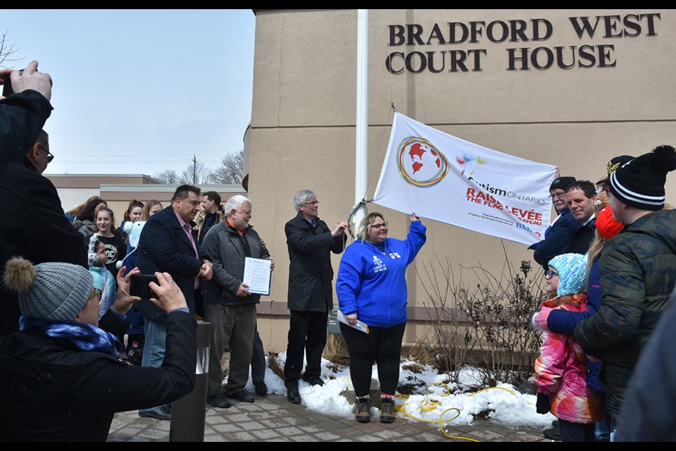 Raising the Autism Awareness Day flag in Bradford. Miriam King/Bradford Today