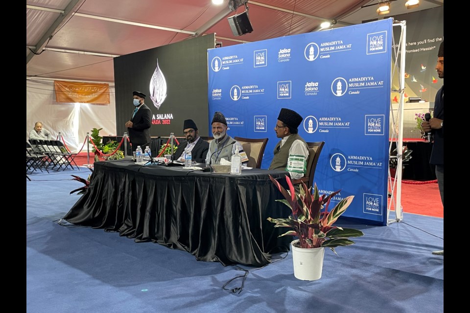 Rizwan Mian, Chief Director of the Jalsa Salana, Lal Khan Malik, National President of the Ahmadiyya Muslim Jama'at, and Imam Abdul Rasheed Anwar answer questions during the annual conventions opening press conference.