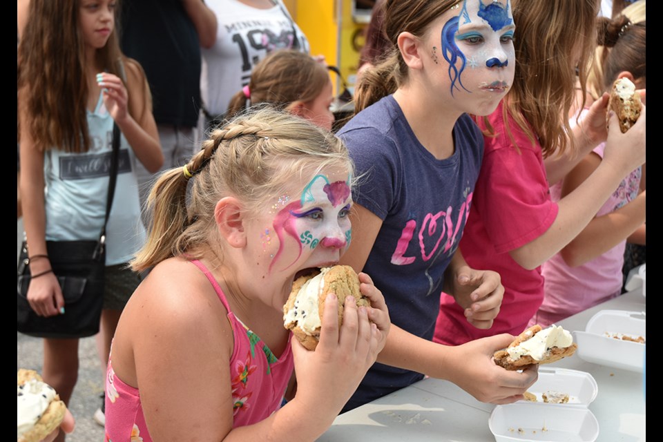 Taking a big bite at the 3 Scoops ice cream-eating contest at Carrot Fest 2018. Miriam King/BradfordToday