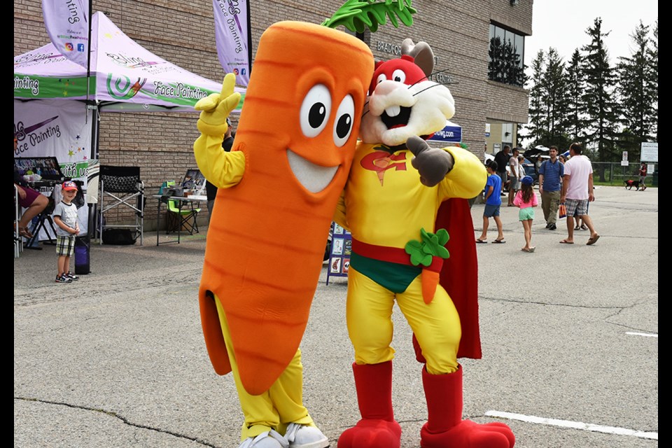 Gwilly and Captain Carrot, mascots of CarrotFest, welcomed visitors to last year's Carrot Fest in Bradford. Miriam King/Bradford Today