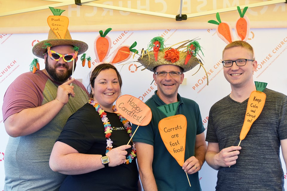Promise Church of Bradford offered great carrot props for the photo booth. Miriam King/Bradford Today