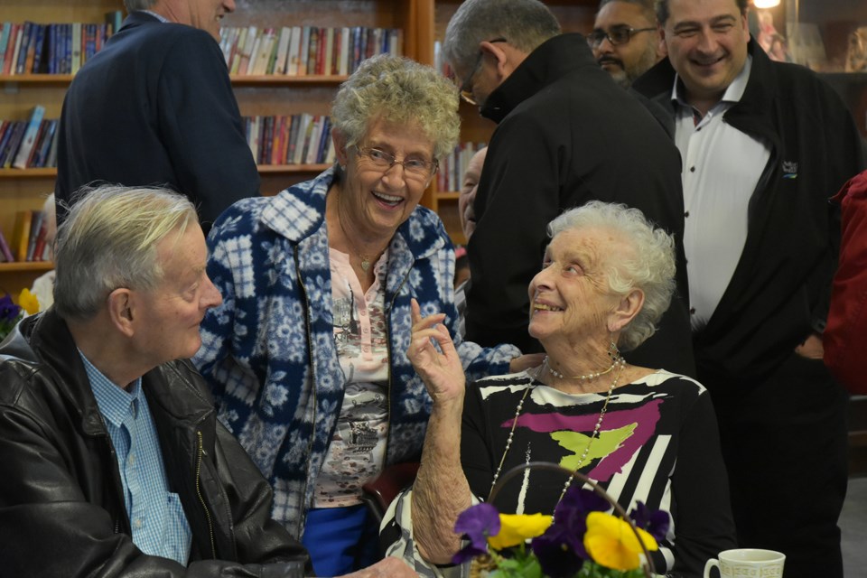 Sylvia Luxton, at right, chats with seniors centre members. Miriam King/Bradford Today