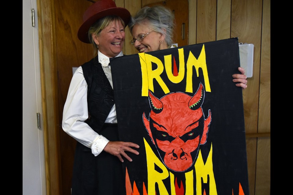 Andrea Nolan, left, and author June Chambers, with a warning against 