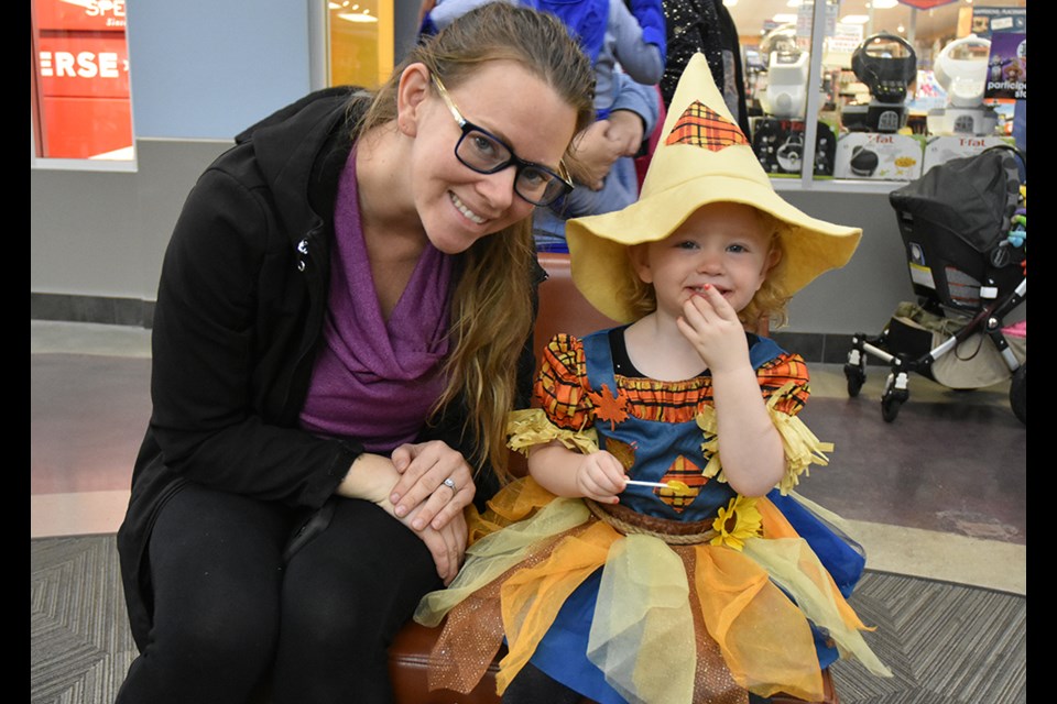 Scarecrow Princess trick-or-treating at Tanger Outlet Mall in Cookstown, with help from mom. Miriam King/Bradford Today