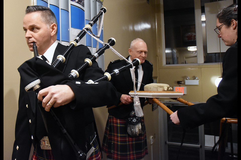 Innisfil Pipes and Drums prepare to pipe in the Haggis at the Lefroy-Belle Ewart Legion's Robbie Burns Dinner. Miriam King/Bradford Today