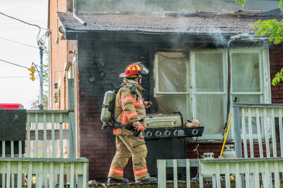 Fire from an unattended BBQ had spread into the walls and roof of the rear porch. Paul Novosad for Bradford Today.