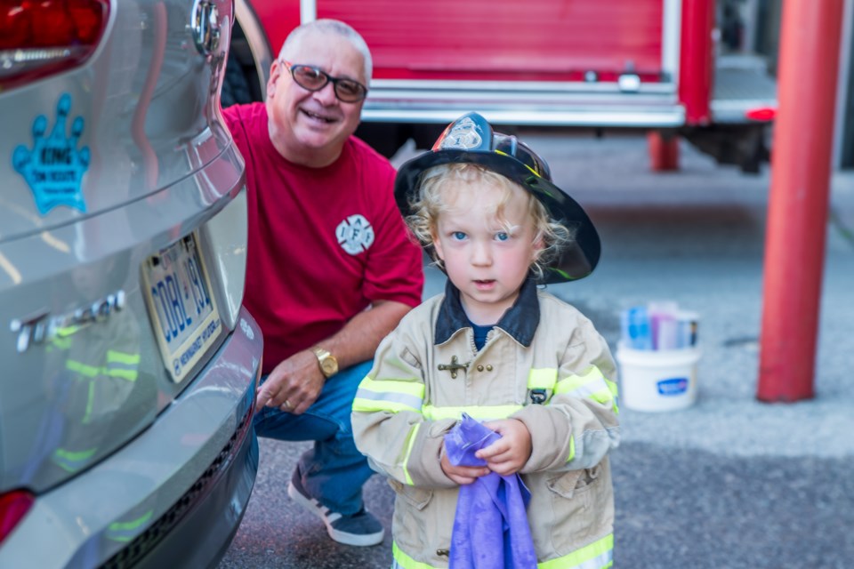 Young Landon stole the show dressed in his firefighter bunker gear. Paul Novosad for Bradford Today.