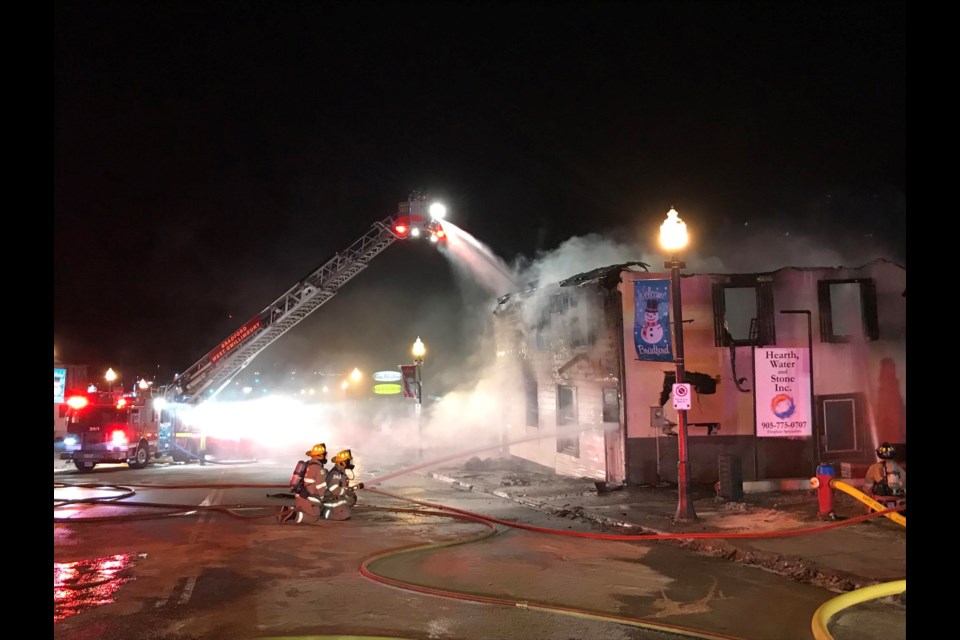 Firefighters respond to a structure fire at 72 and 74 Holland Street E. early morning on Saturday. Photo credit: BWG Fire