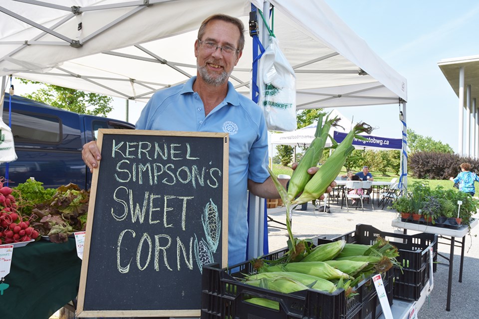 Rob Radcliffe of Lakeview Gardens, with Kernel Simpson’s Sweet Corn. Miriam King/BradfordToday