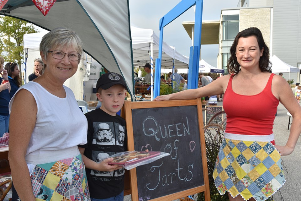 Three generations help out at The Queen of Tarts – from left, Pierrette, nine-year-old Marcel, and Suzanne. Miriam King/BradfordToday