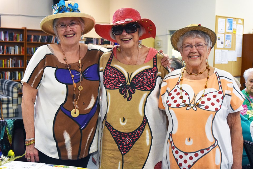 From left, Lyn Kanyo, Daisy Koleff and Olga Bishop in summery t-shirts. 'It's the only bikini you'll see me in,' said Olga, at the Danube Srs. Leisure Centre. Miriam King/Bradford Today