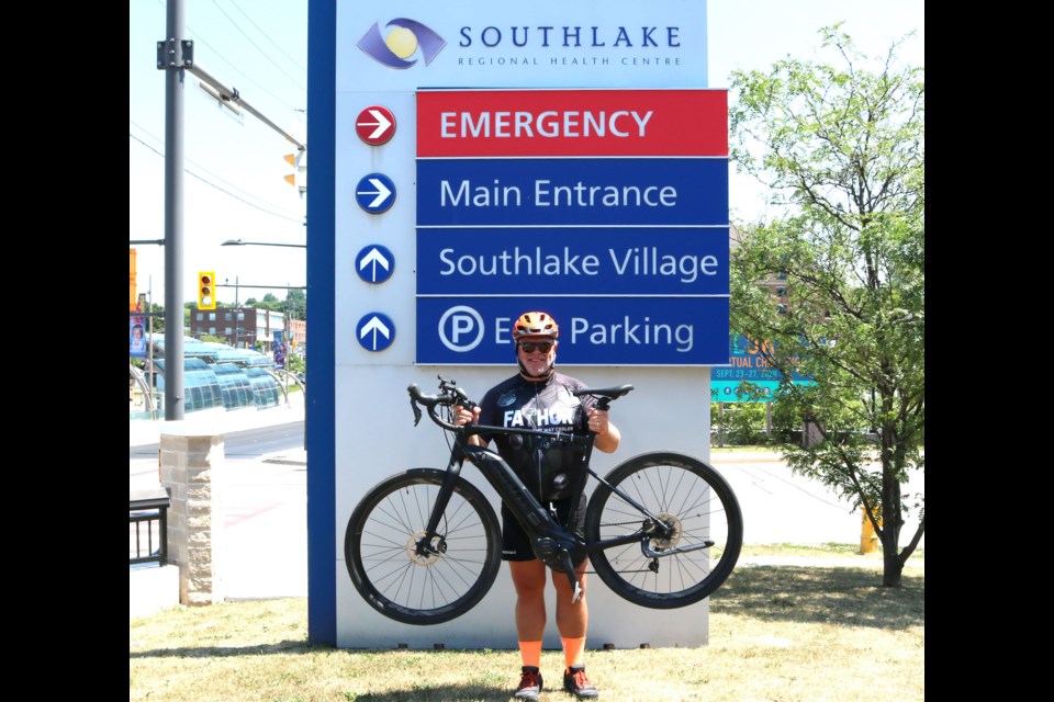 Tim Brochu prepares to set off on his 600-km ride from Southlake Regional Health Centre
to Montreal, one of two hospitals he is raising funds and awareness for through this initiative. Supplied photo/Southlake Regional Health Centre Foundation