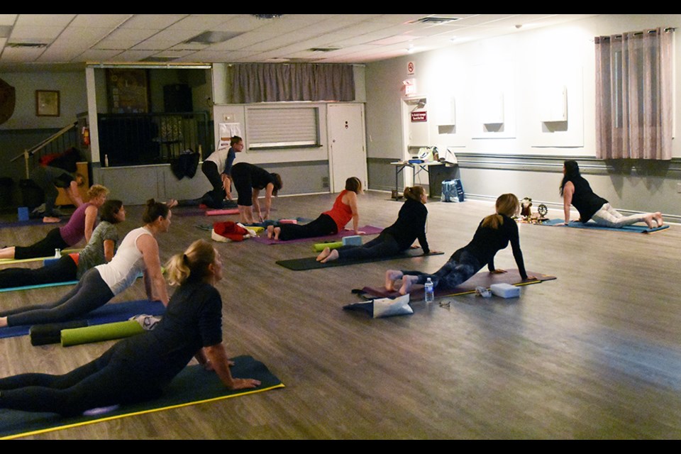Yoga class at the Innisfil Lions Hall in Alcona meets every Wednesday evening. Miriam King/Bradford Today