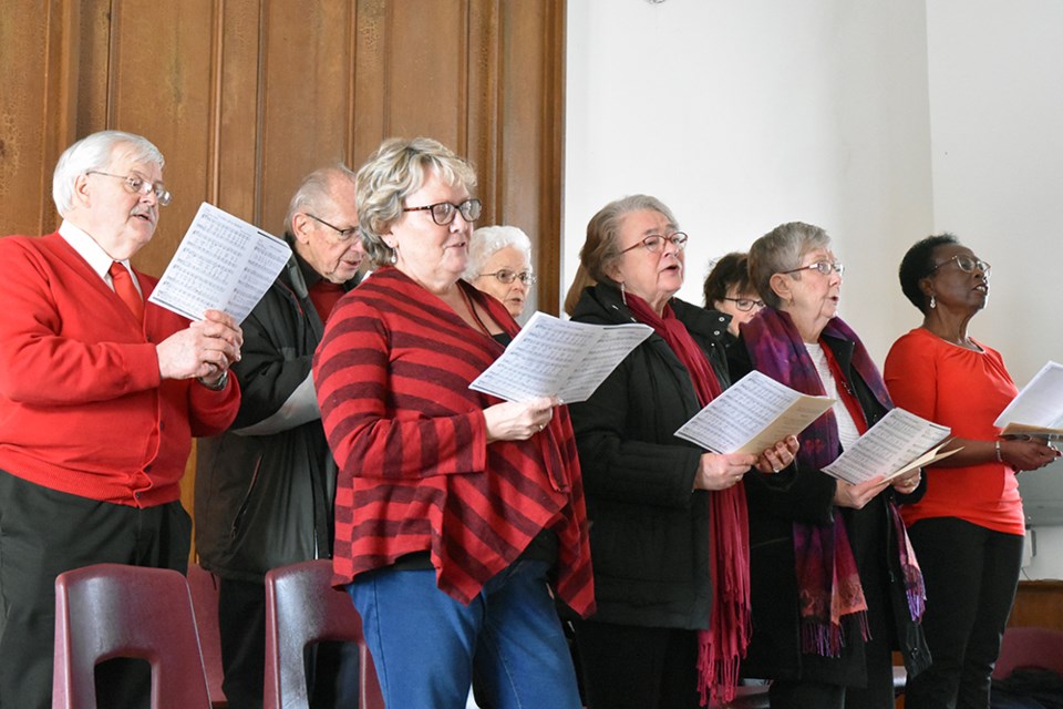 Choir from St. John's Presbyterian Church in Bradford led the singing of Christmas Carols at the Auld Kirk on Sunday. Miriam King/Bradford Today