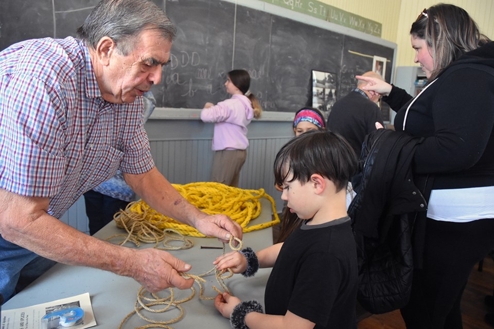 Brian Pratt demonstrates the art of tying knots, at the Knock School House on Family Day. Miriam King/Bradford Today